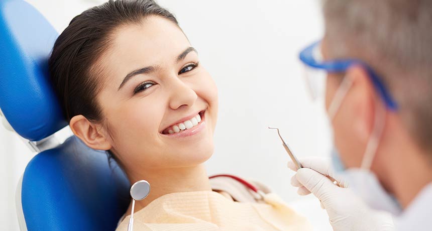 Patient smiling while in the dentist chair
